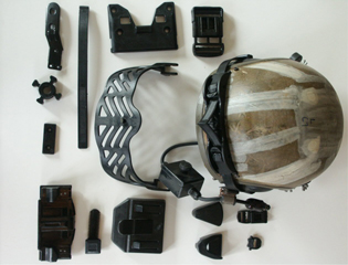 samples of parts for military applications molded from a variety of materials.